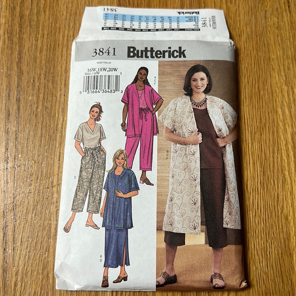 Uncut sewing pattern women’s jacket, dress, top, pants, duster